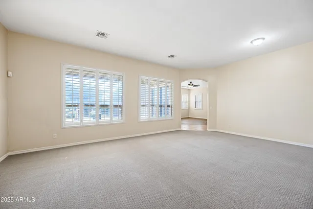 an empty room with windows