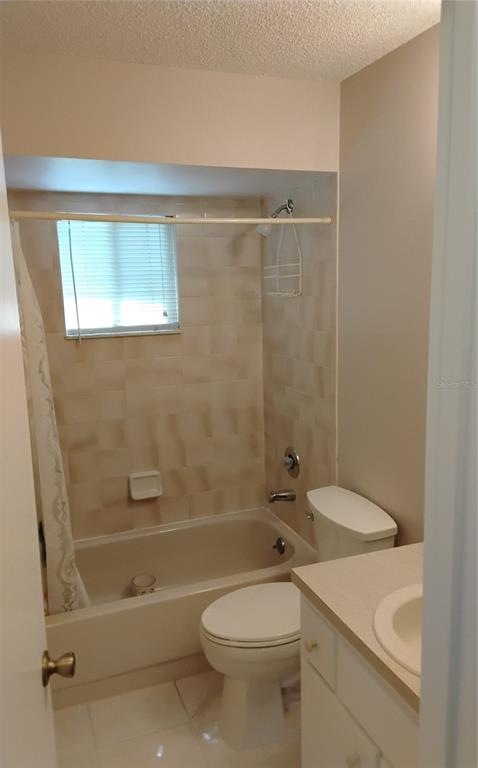 8328 Southwest 106th Place Ocala, FL 34481 - Photo 16 of 23 a bathroom with a sink a toilet and shower