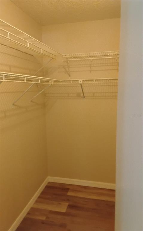 8328 Southwest 106th Place Ocala, FL 34481 - Photo 20 of 23 a view of a room with wooden floor and small space