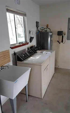 a kitchen with a stove and a refrigerator