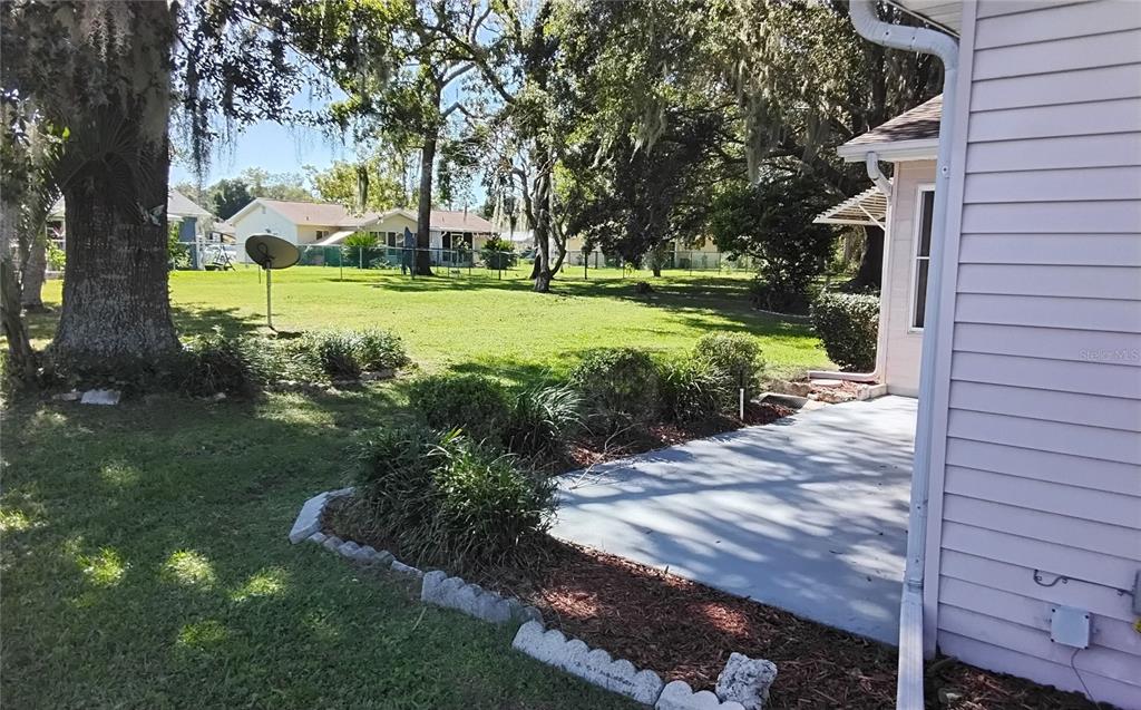 8328 Southwest 106th Place Ocala, FL 34481 - Photo 3 of 23 a view of a park with large trees