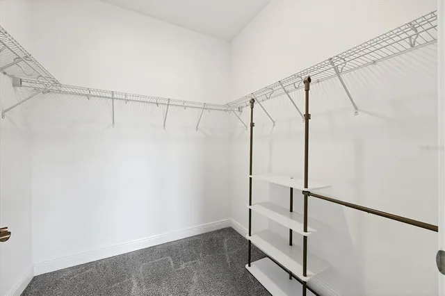 a view of an empty walk in closet