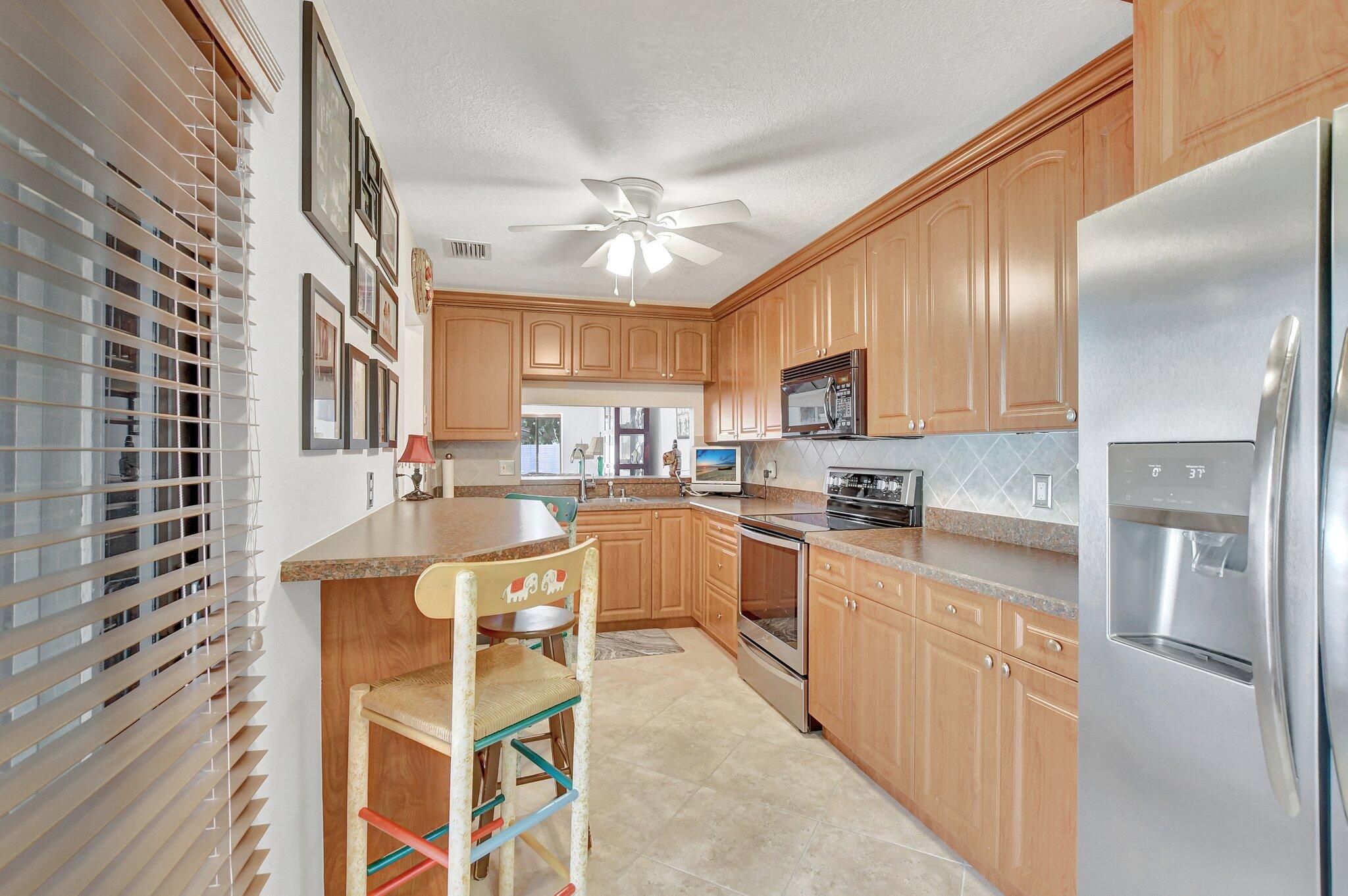 6798 Consolata Street Boca Raton, FL 33433 - Photo 8 of 39 KITCHEN