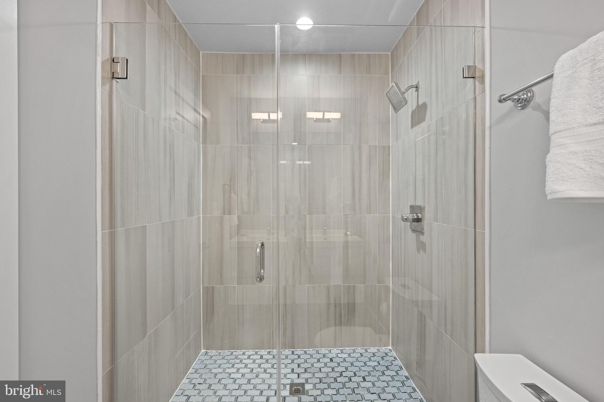 1124 4th Street Northeast Washington, DC 20002 - Photo 16 of 34 a bathroom with a shower and a toilet