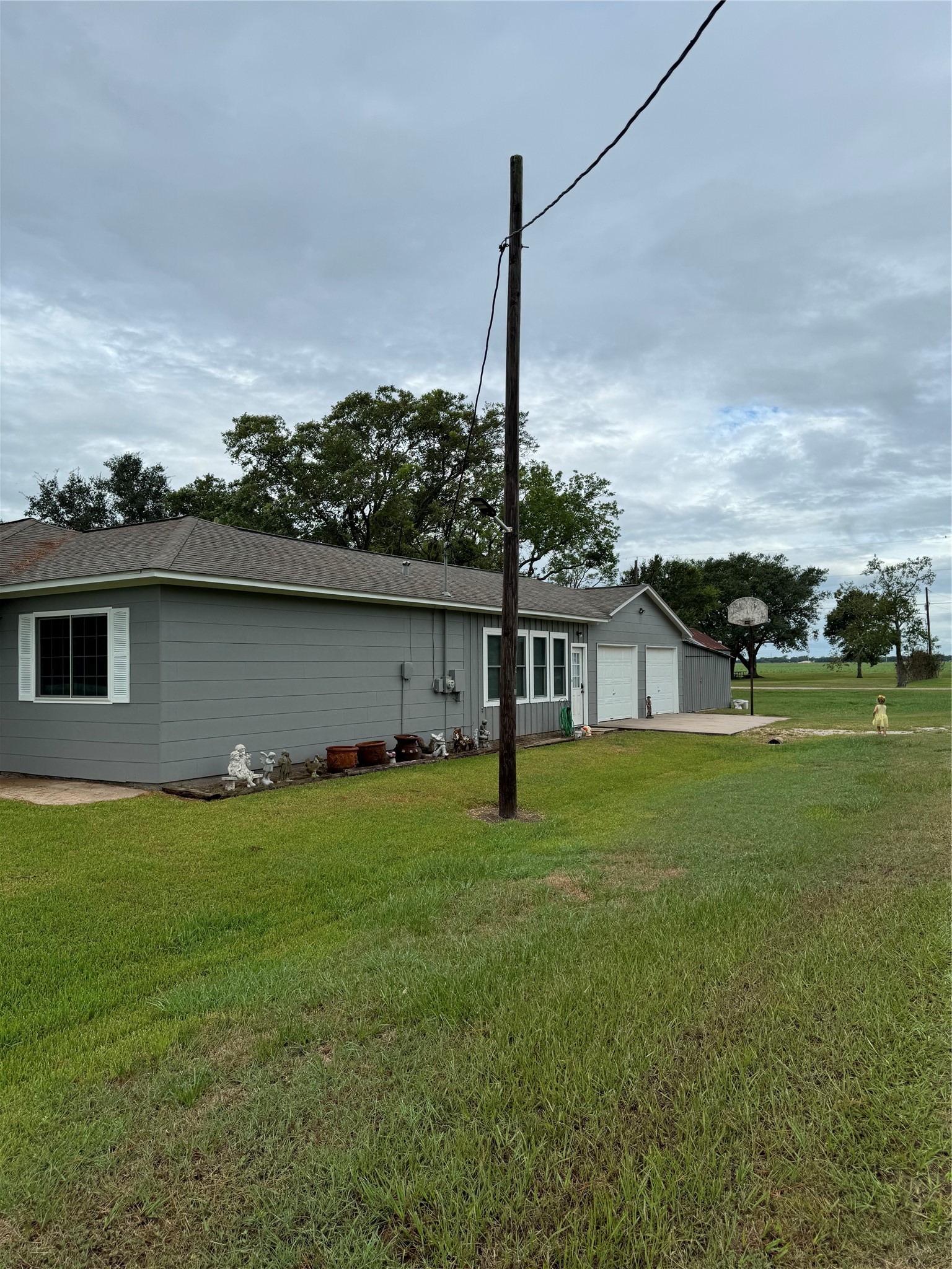 1239 Fm 1160 Road Louise, TX 77455 - Photo 12 of 24 a front view of a house with garden