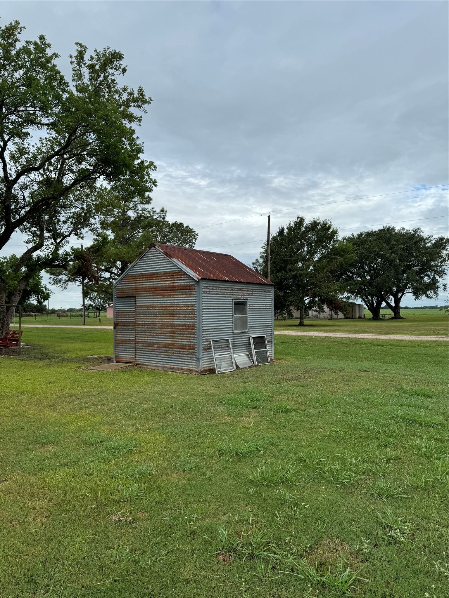 1239 Fm 1160 Road Louise, TX 77455 - Photo 14 of 24 a view of a house with a big yard