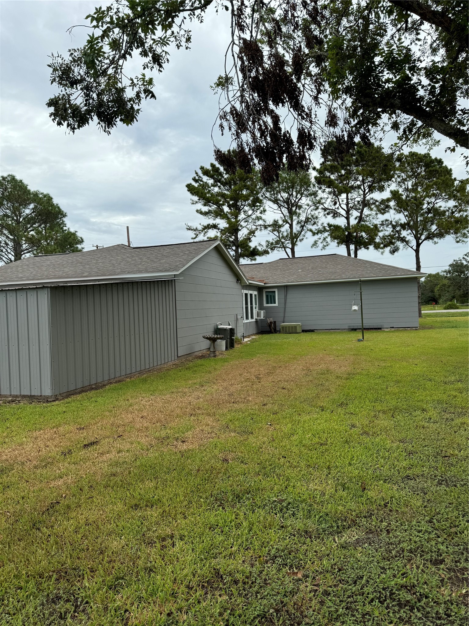 1239 Fm 1160 Road Louise, TX 77455 - Photo 18 of 24 a view of a house with a backyard