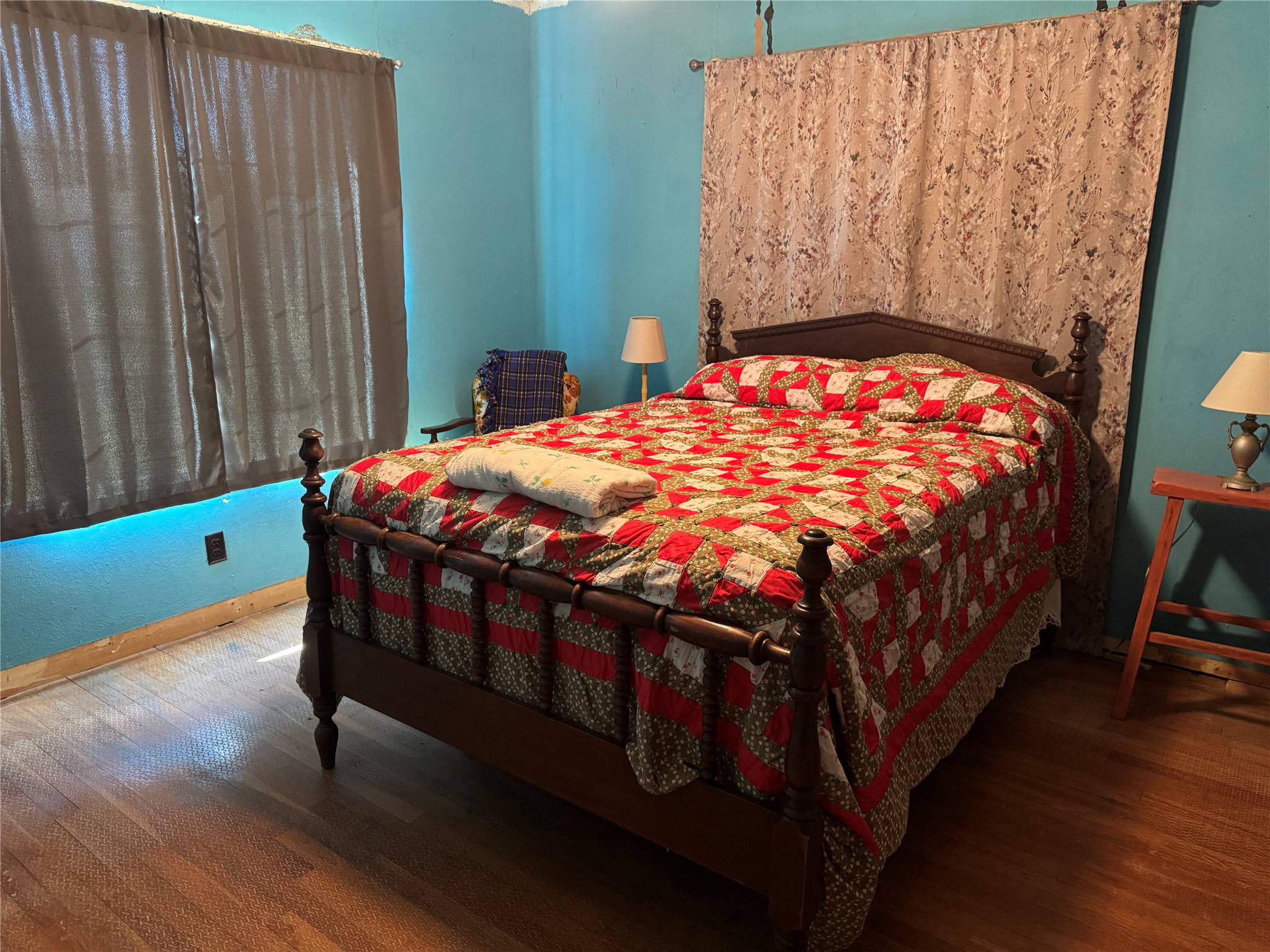 1239 Fm 1160 Road Louise, TX 77455 - Photo 20 of 24 a bed sitting in a bedroom next to a wooden cabinet
