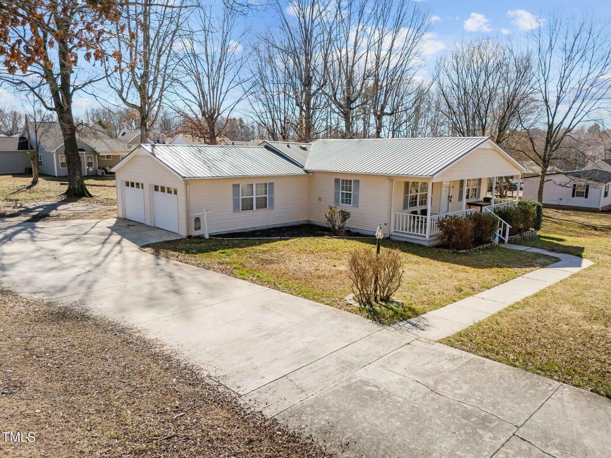 231 Patterson Drive Roxboro, NC 27573 - Photo 11 of 43 11-web-or-mls-DJI_20250228135815_0027_D