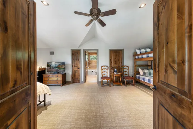 a view of a livingroom with furniture and a window