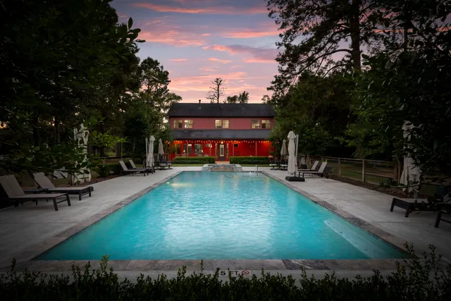 a view of a swimming pool with a patio