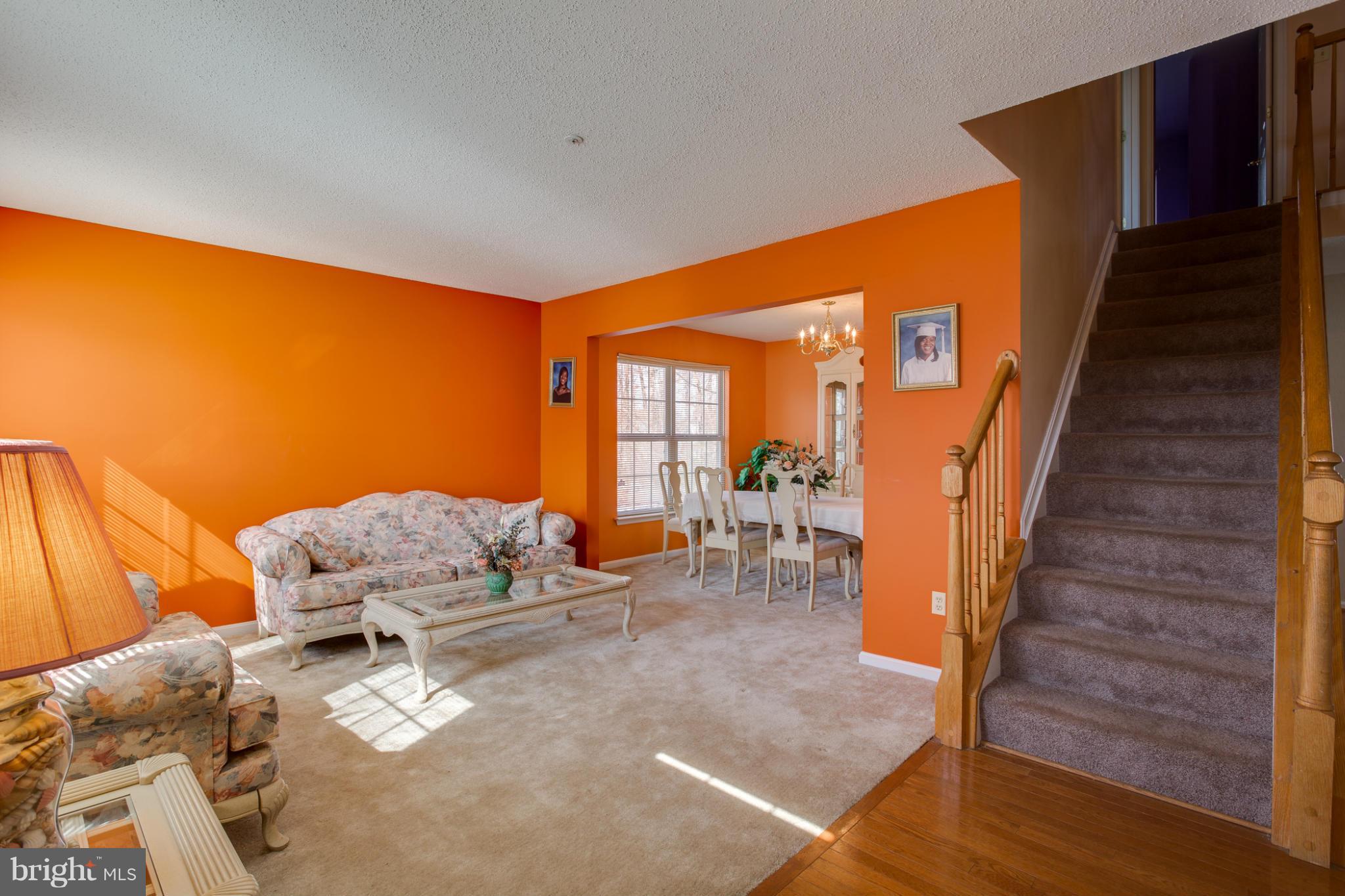 9404 Hobart Street Springdale, MD 20721 - Photo 5 of 29 Living Room Dining Room
