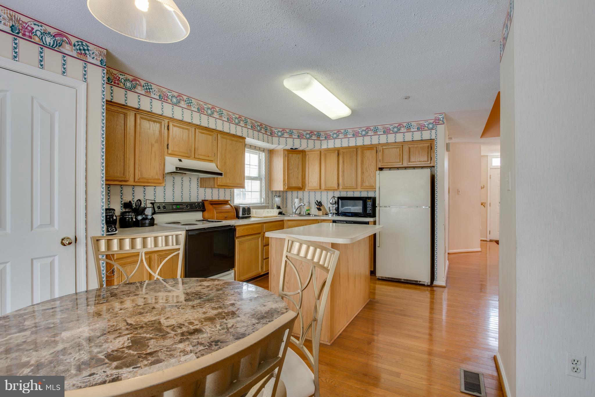 9404 Hobart Street Springdale, MD 20721 - Photo 9 of 29 Kitchen