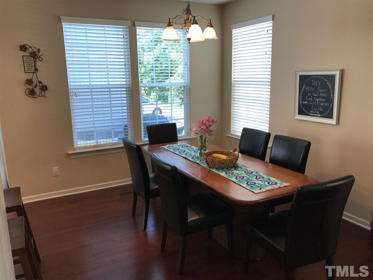 1048 Ileagnes Road Raleigh, NC 27603 - Photo 4 of 11 a dining room with furniture and window