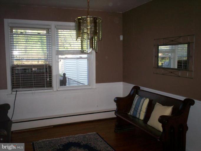 3822 Elkader Road Baltimore, MD 21218 - Photo 5 of 7 a view of wooden floor and windows