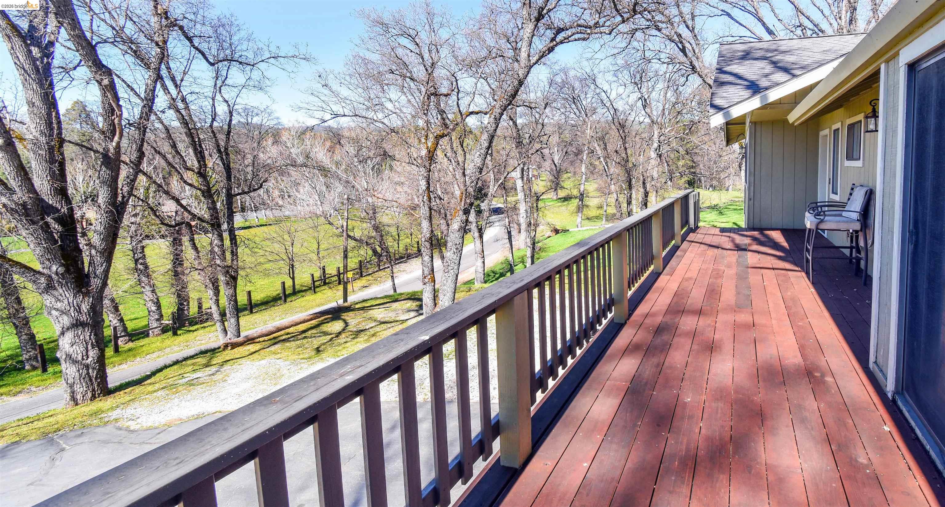15170 Potato Ranch Road Sonora, CA 95370 - Photo 47 of 49 Wooden deck with a yard