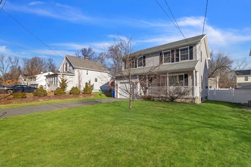 29 Bruce Street Springfield, MA 01119 - Photo 3 of 42 a view of a house with a yard