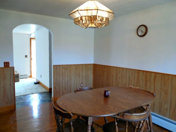 282 Palmer Road Ware, MA 01082 - Photo 6 of 27 a view of a dining room with furniture and wooden floor