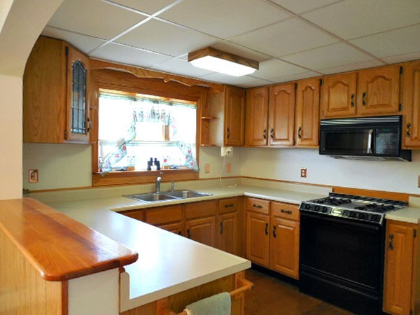 282 Palmer Road Ware, MA 01082 - Photo 8 of 27 a kitchen with stainless steel appliances granite countertop a sink and a stove