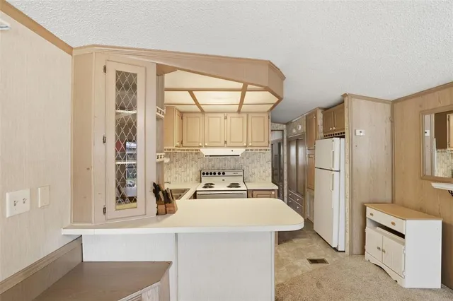 a bathroom with a sink a mirror and a shower