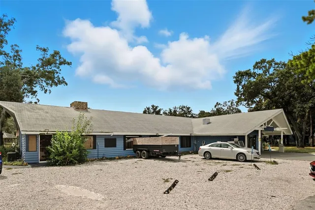 an front view of a house with a yard