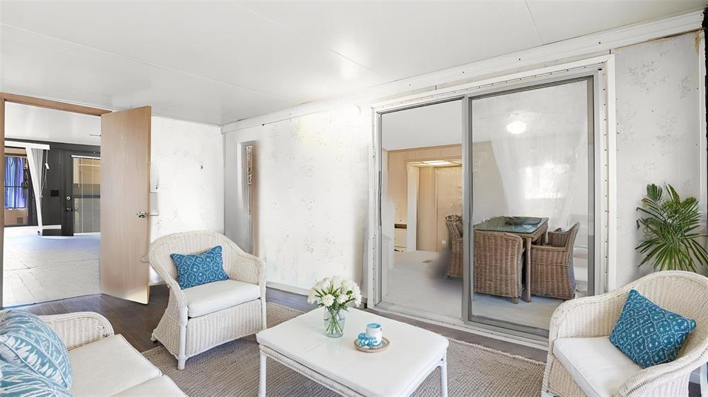 3000 Clarcona Road, Unit 362 Apopka, FL 32703 - Photo 7 of 32 a living room with furniture and a potted plant