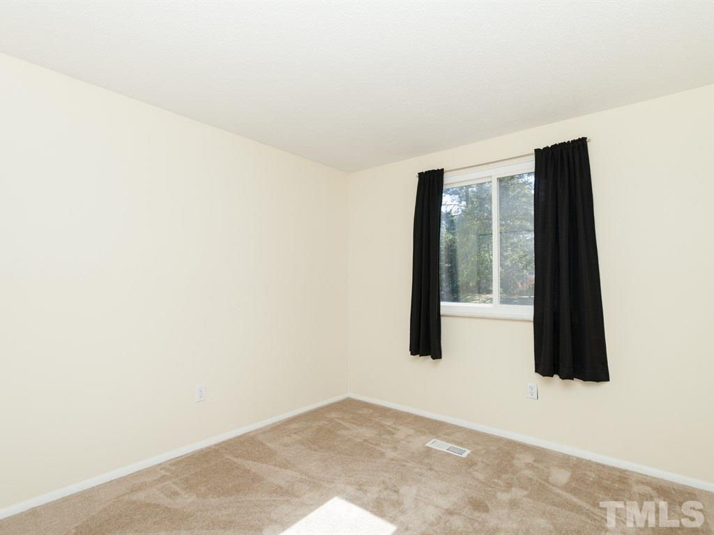 7261 Mine Shaft Road Raleigh, NC 27615 - Photo 14 of 25 a view of an empty room and window