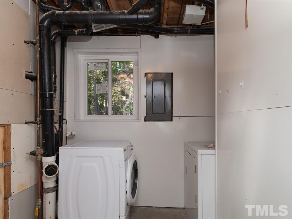 7261 Mine Shaft Road Raleigh, NC 27615 - Photo 22 of 25 a view of a closet and a window in a room