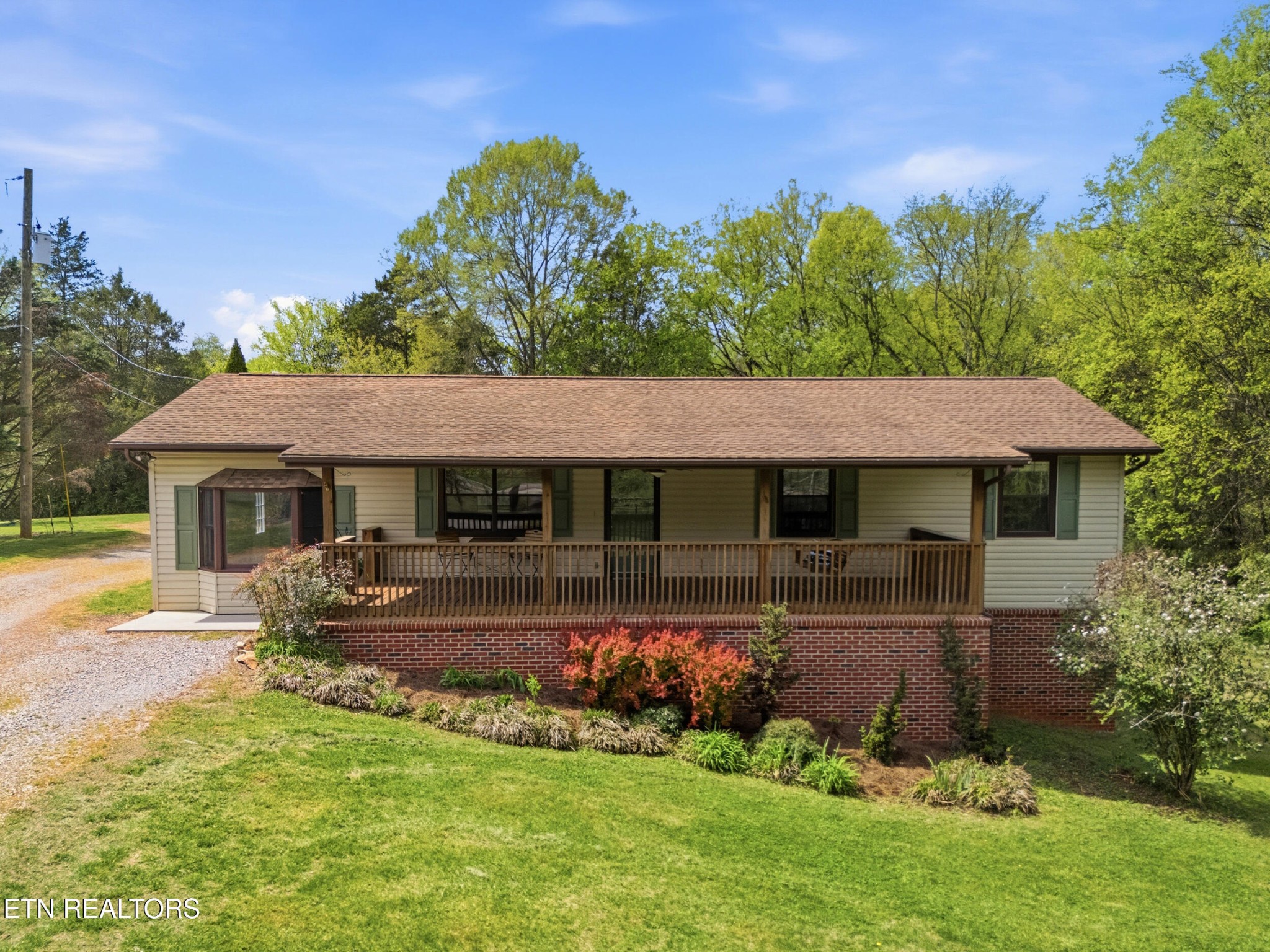 1835 Wilson Road Lenoir City, TN 37772 - Photo 1 of 57 a front view of a house with a yard