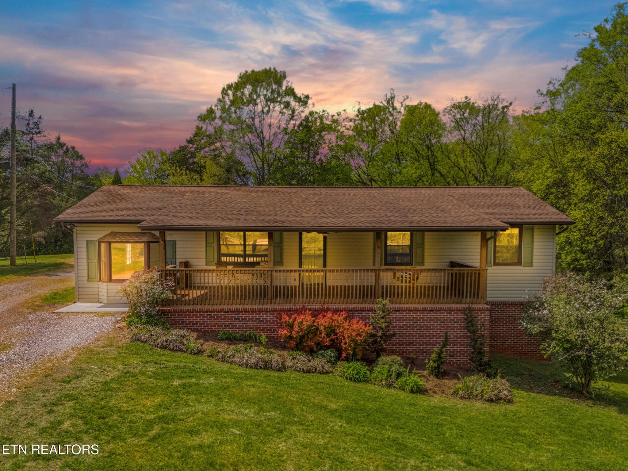 1835 Wilson Road Lenoir City, TN 37772 - Photo 2 of 57 front view of a house with a yard