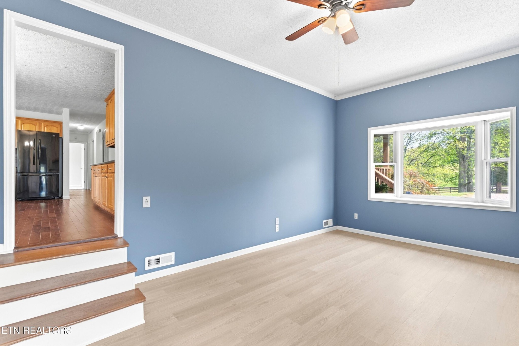 1835 Wilson Road Lenoir City, TN 37772 - Photo 25 of 57 an empty room with fan and windows