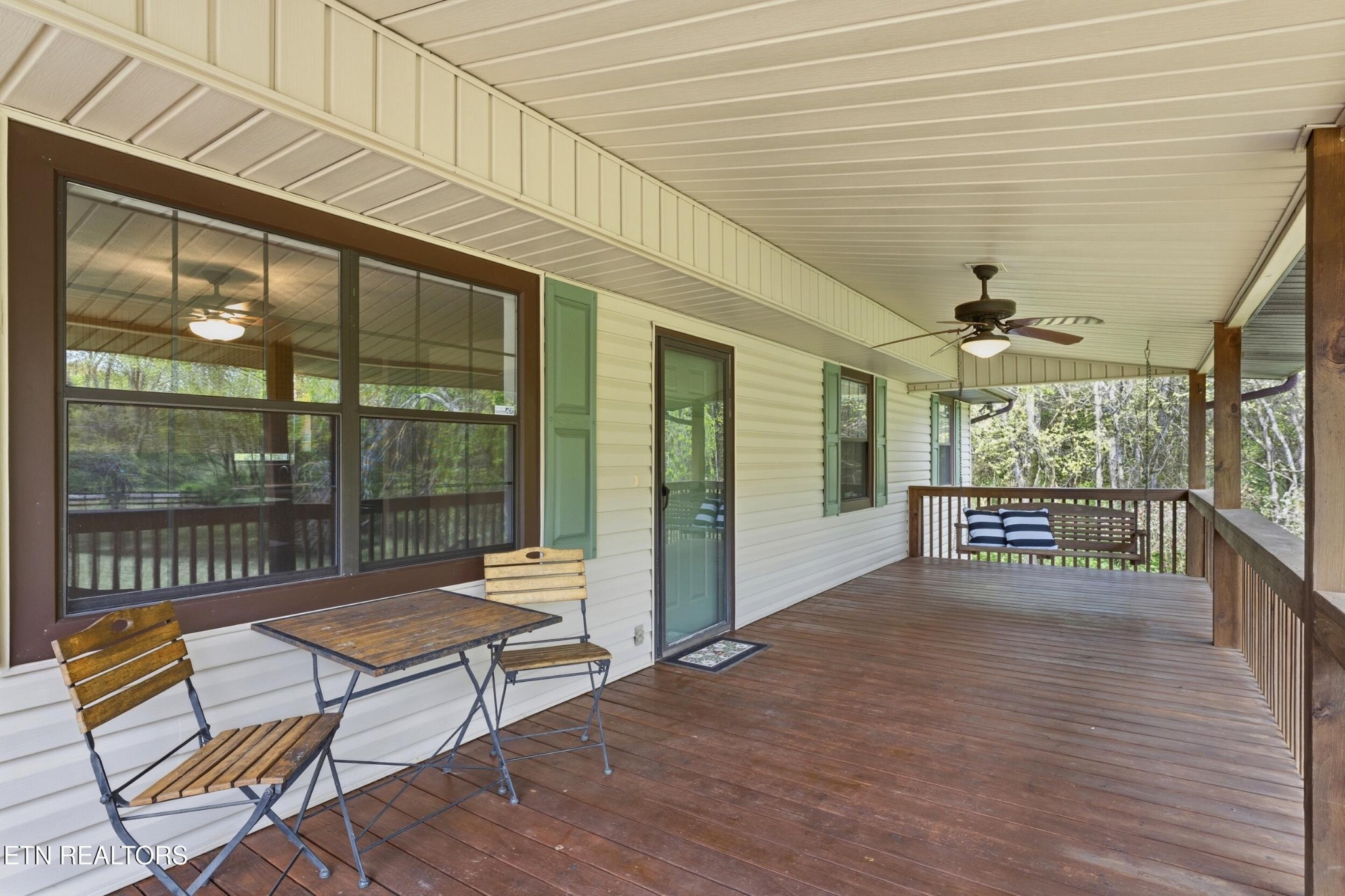 1835 Wilson Road Lenoir City, TN 37772 - Photo 3 of 57 a balcony with furniture and a potted plant