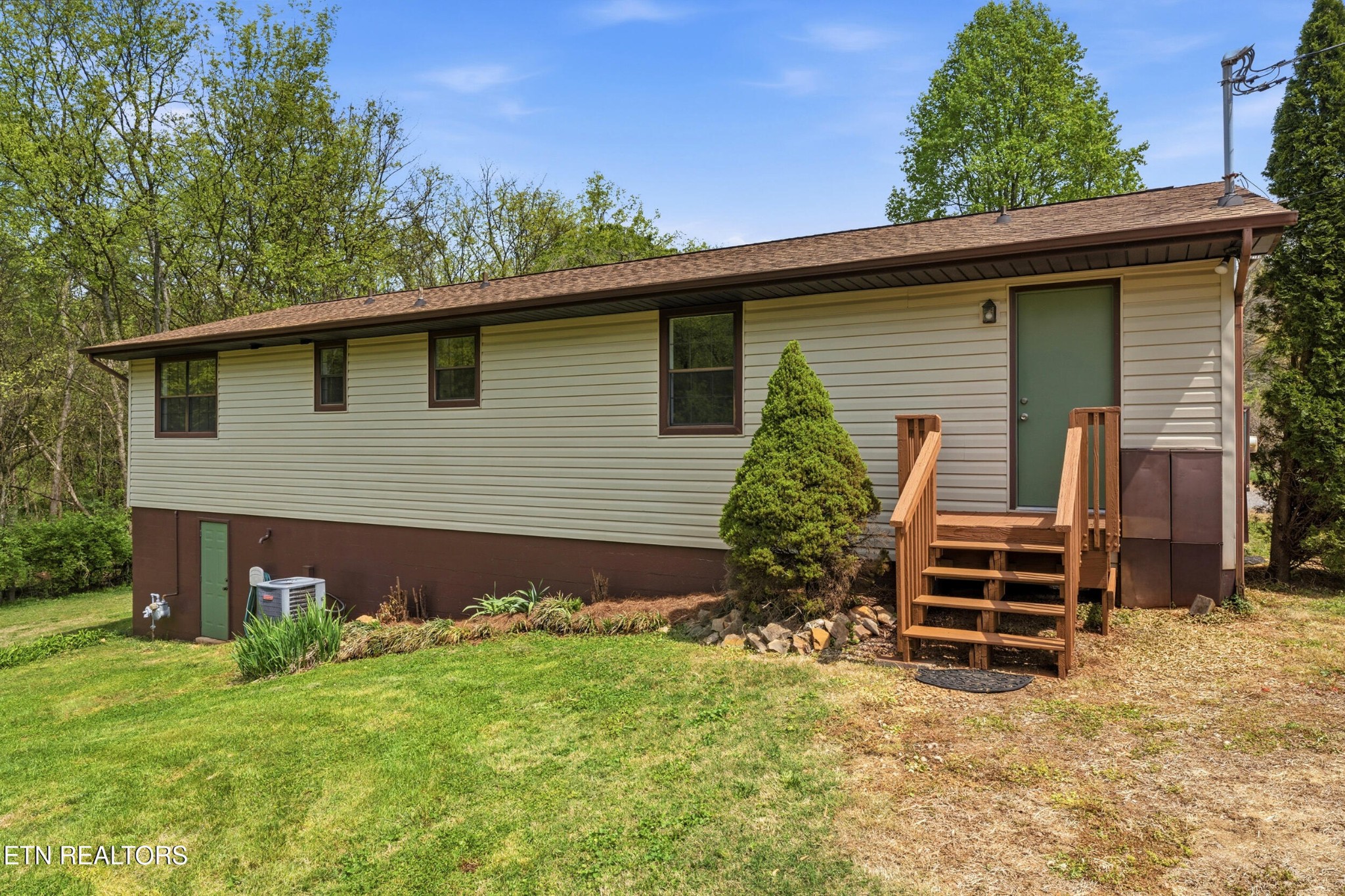 1835 Wilson Road Lenoir City, TN 37772 - Photo 38 of 57 a front view of a house with garden