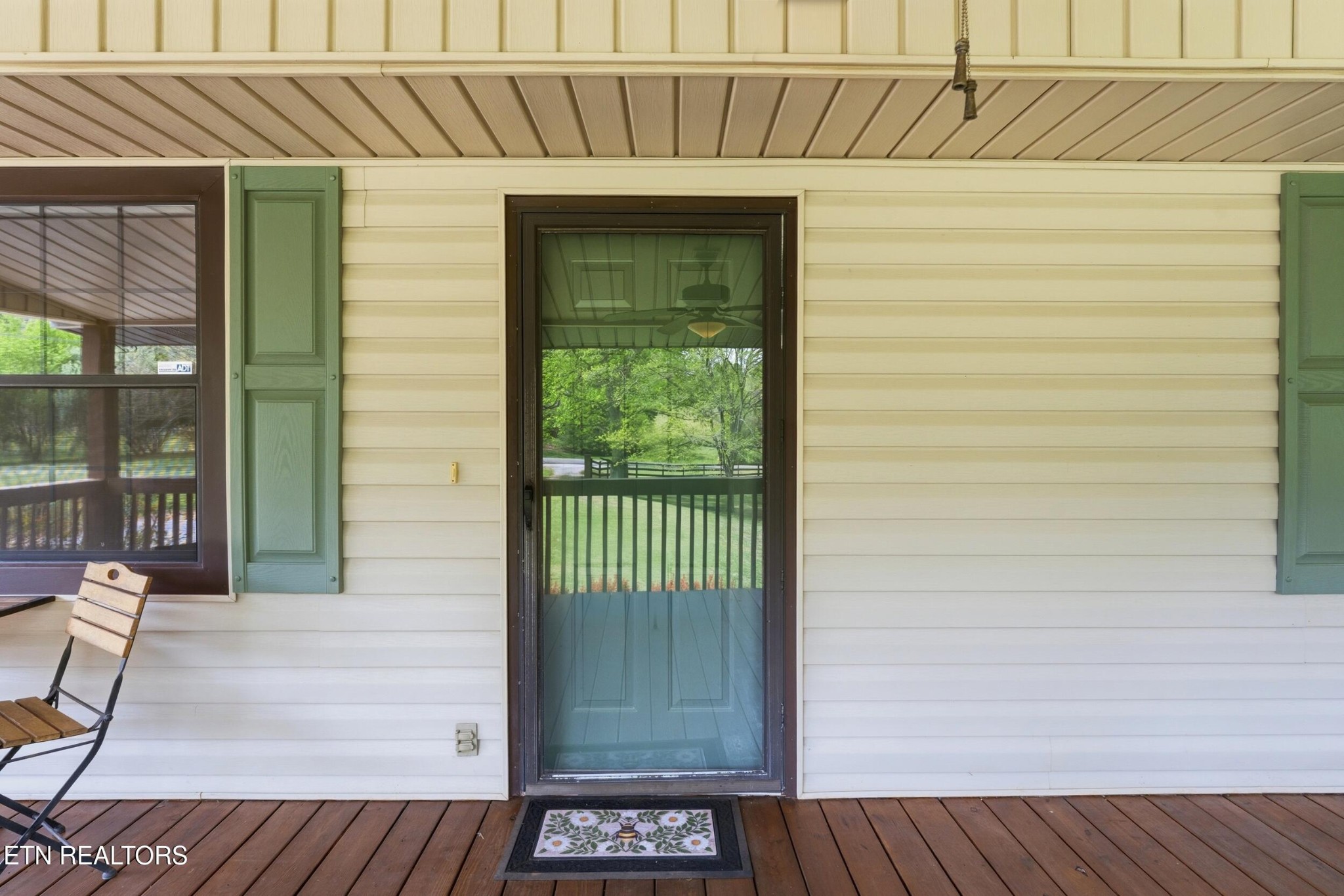 1835 Wilson Road Lenoir City, TN 37772 - Photo 4 of 57 a view of a porch with wooden floor