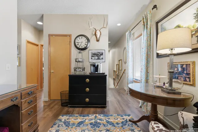 a living room with couch and a table