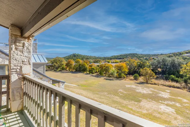 a view of an ocean and a mountain
