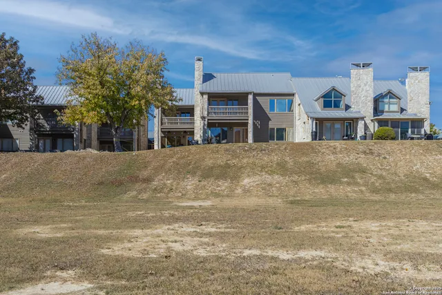 a front view of building with blue lights
