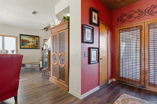 a view of livingroom with furniture and a window