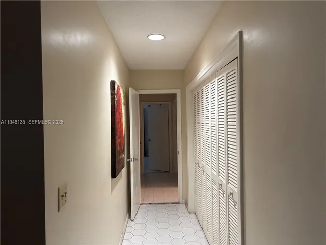 a kitchen with stainless steel appliances granite countertop a stove and a refrigerator