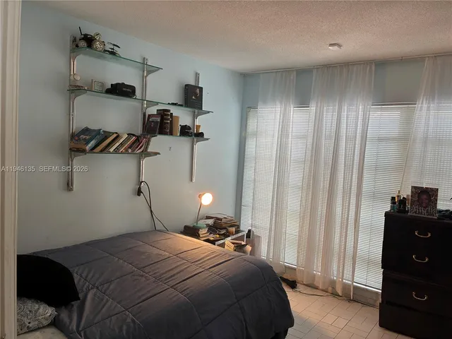 a view of a yard with plants