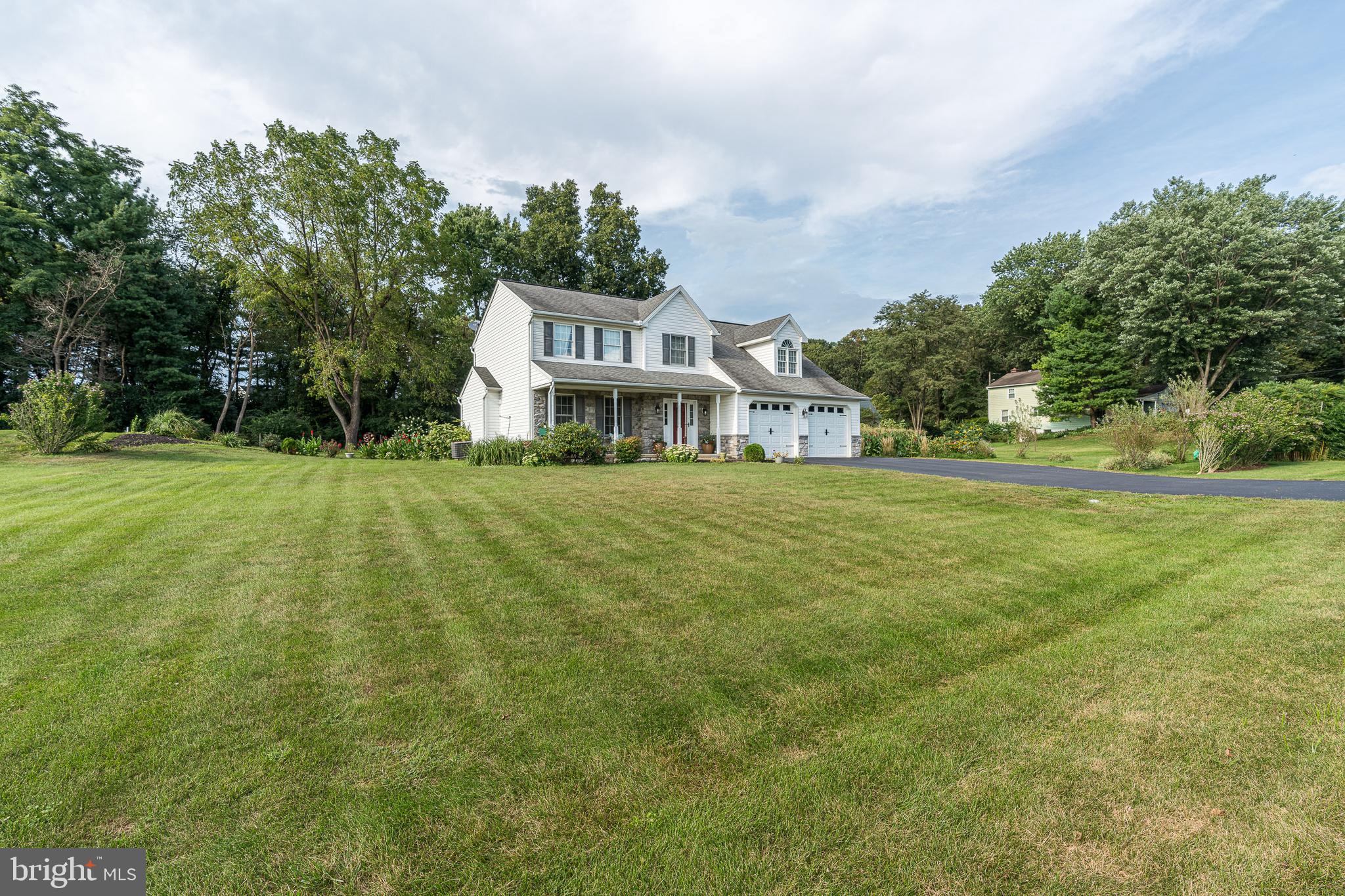 802 Augusta Drive Lititz, PA 17543 - Photo 40 of 47 a view of a house with a big yard and large trees
