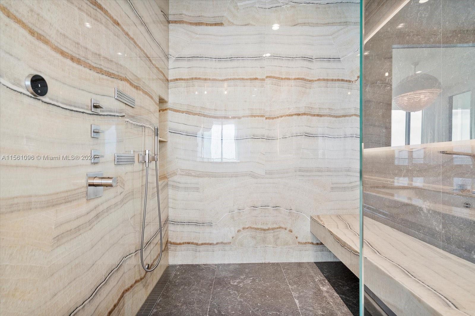 17901 Collins Avenue, Unit 902 Sunny Isles Beach, FL 33160 - Photo 29 of 47 a bathroom with a bathtub and shower