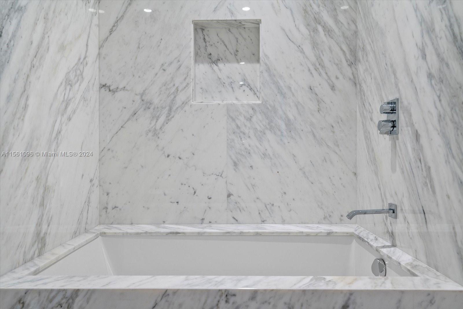 17901 Collins Avenue, Unit 902 Sunny Isles Beach, FL 33160 - Photo 39 of 47 a bathroom with bathtub and shower