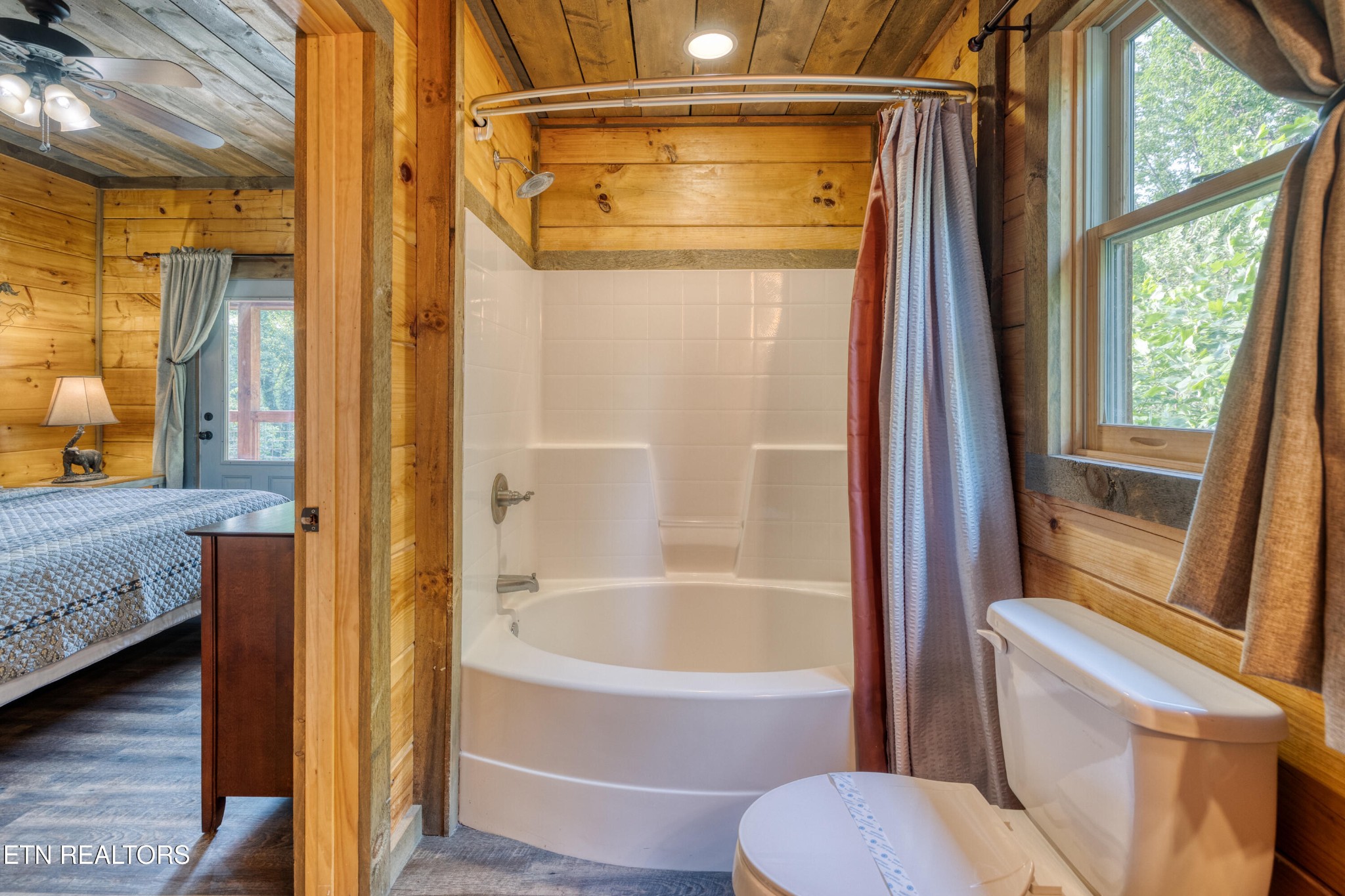 809 Pinecrest Way Sevierville, TN 37862 - Photo 20 of 60 a bathroom with a tub and shower
