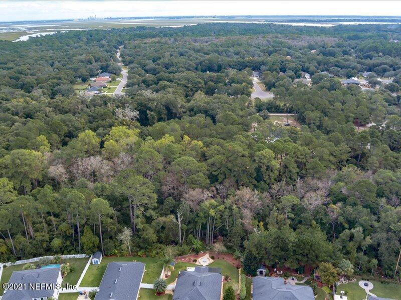 0 Chester River Road Yulee, FL 32097 - Photo 9 of 10 an aerial view of a city with lots of residential buildings