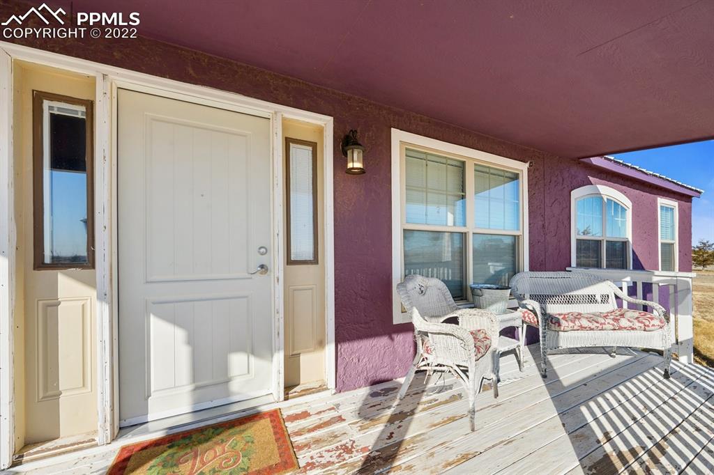 6260 Night Train Lane Yoder, CO 80864 - Photo 12 of 24 a living room with furniture and a window
