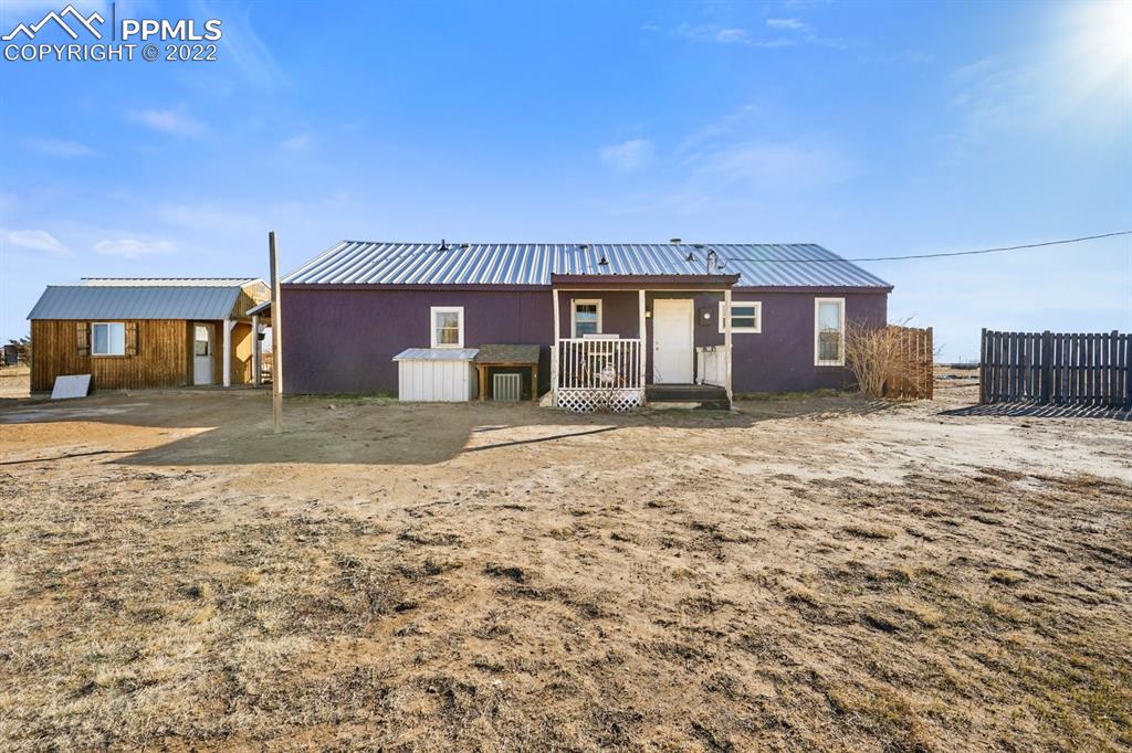 6260 Night Train Lane Yoder, CO 80864 - Photo 9 of 24 a house view with a outdoor space