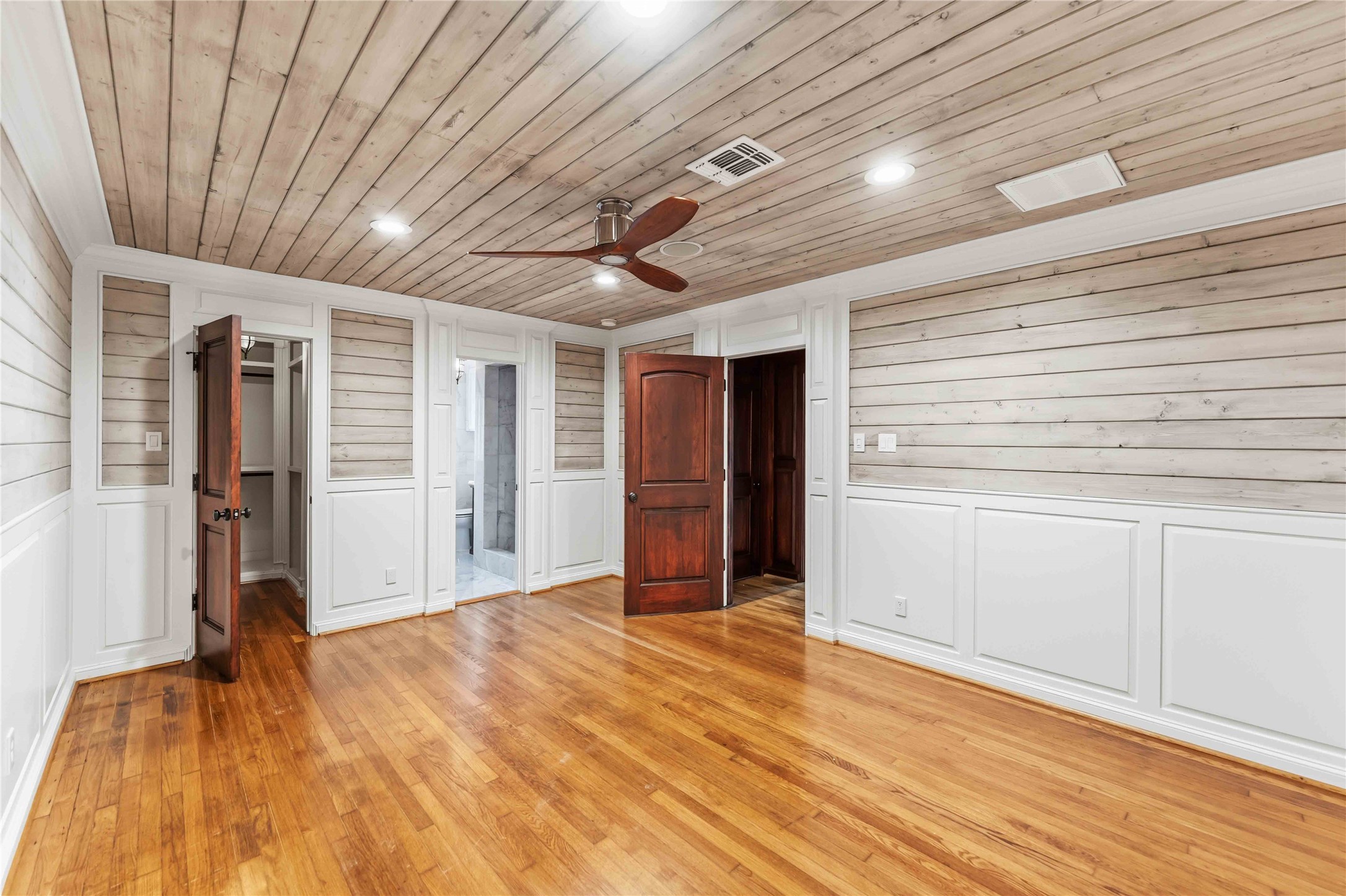 4031 Fernwood Drive Houston, TX 77021 - Photo 23 of 34 a view of empty room with wooden floor