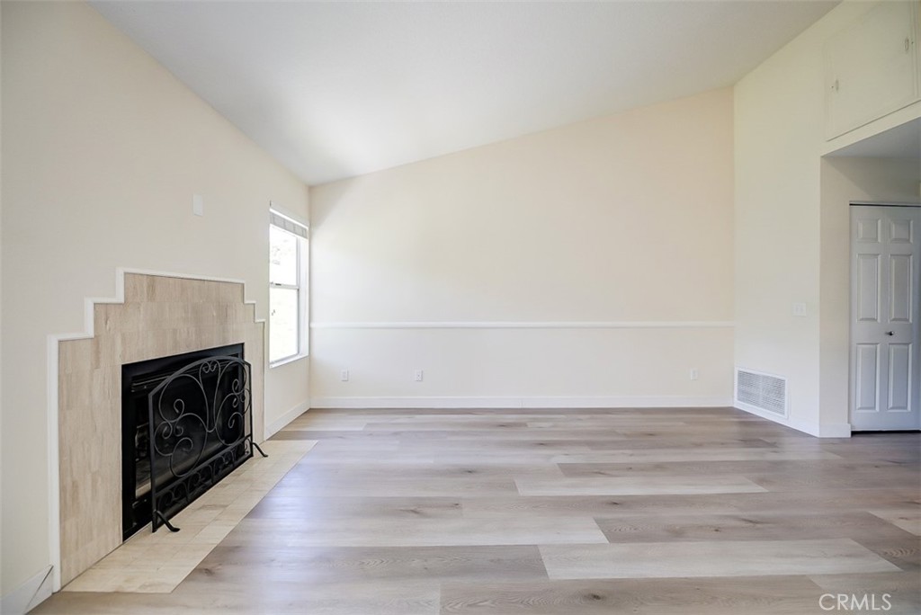45 Campton Place Laguna Niguel, CA 92677 - Photo 12 of 22 a room with a fireplace and a fireplace