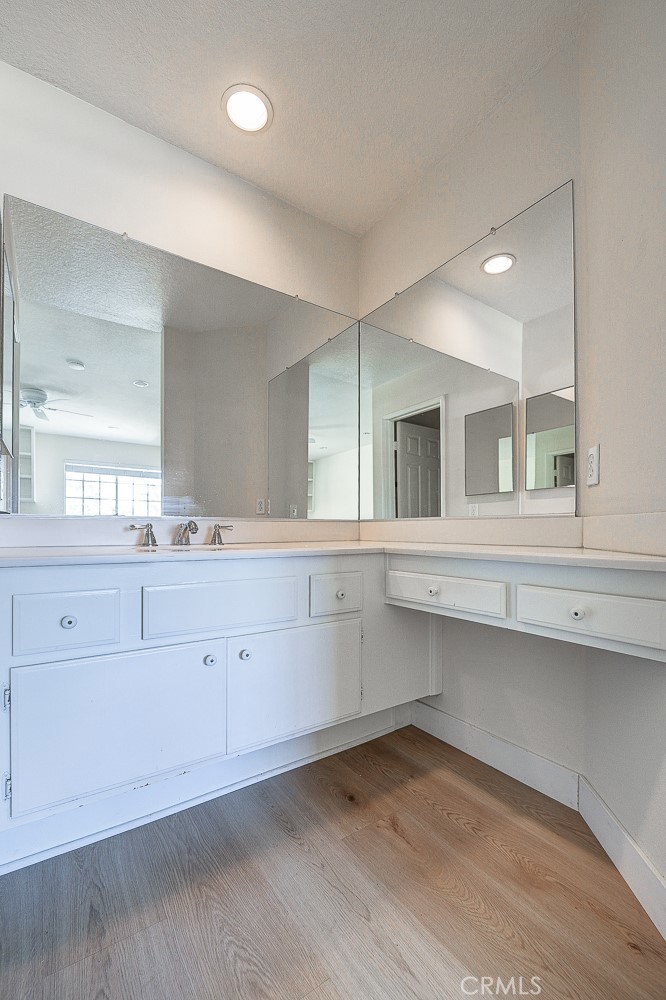 45 Campton Place Laguna Niguel, CA 92677 - Photo 20 of 22 a bathroom with a sink and a mirror